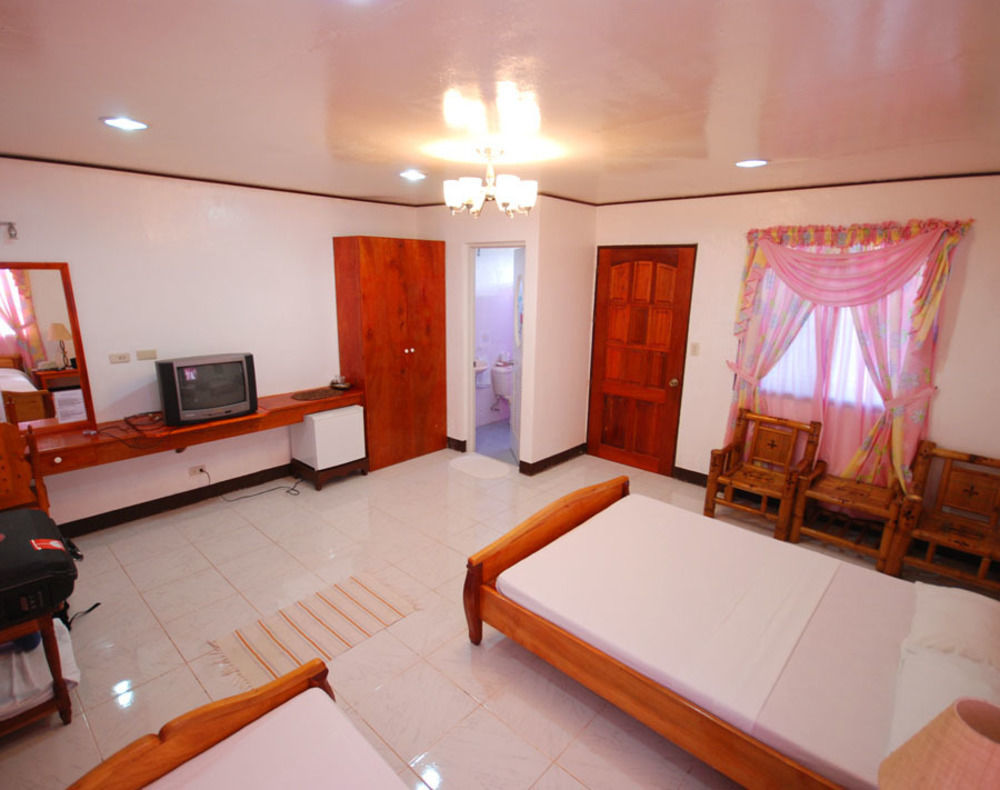 Reddoorz Premium @ Flower Beach Anda Анда Екстериор снимка