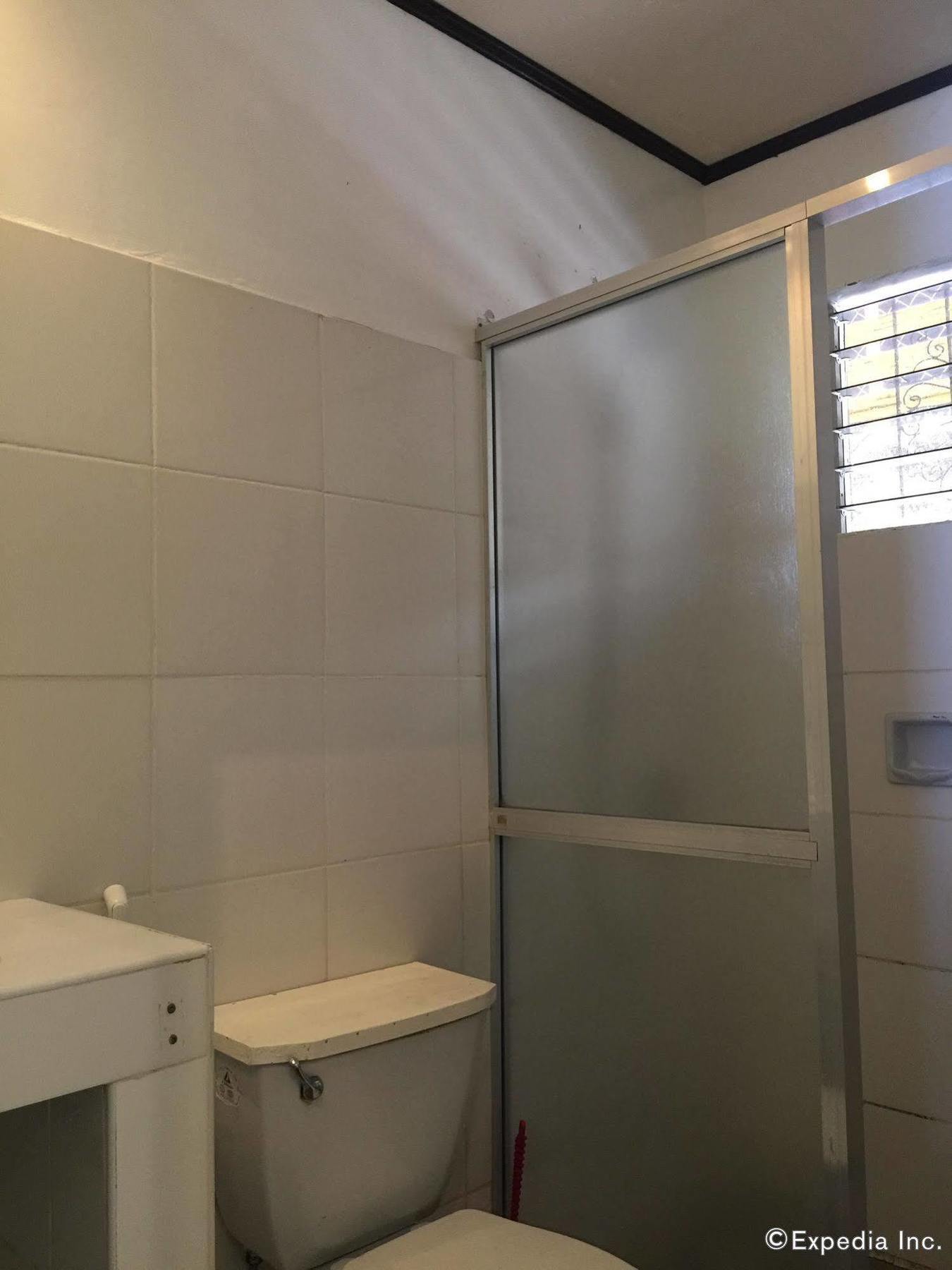 Reddoorz Premium @ Flower Beach Anda Анда Екстериор снимка