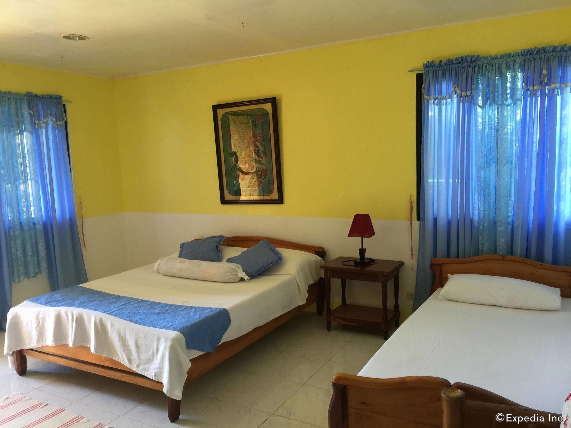 Reddoorz Premium @ Flower Beach Anda Анда Екстериор снимка